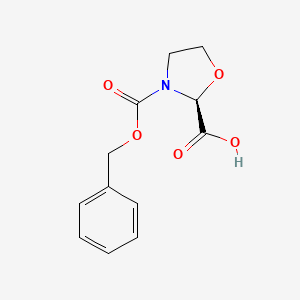 molecular formula C12H13NO5 B13027046 (S)-3-((Benzyloxy)carbonyl)oxazolidine-2-carboxylicacid 