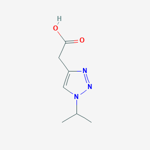 molecular formula C7H11N3O2 B13029312 2-[1-(propan-2-yl)-1H-1,2,3-triazol-4-yl]acetic acid 