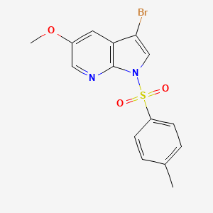 molecular formula C15H13BrN2O3S B13029513 3-Bromo-5-methoxy-1-(4-methylphenyl)sulfonylpyrrolo[2,3-b]pyridine 