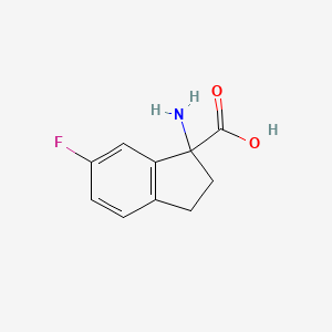 1-Amino-6-fluoro-2,3-dihydro-1H-indene-1-carboxylic acid