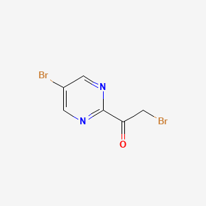 molecular formula C6H4Br2N2O B13032527 2-Bromo-1-(5-bromopyrimidin-2-YL)ethanone 