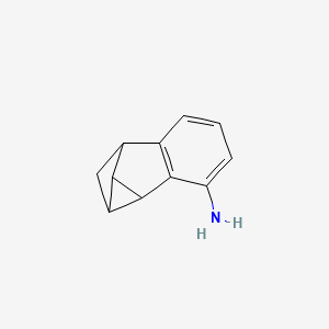 molecular formula C11H11N B13033307 1,1a,6,6a-Tetrahydro-1,6-methanocyclopropa[a]inden-2-amine 