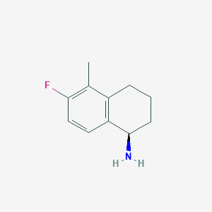 (R)-6-Fluoro-5-methyl-1,2,3,4-tetrahydronaphthalen-1-amine