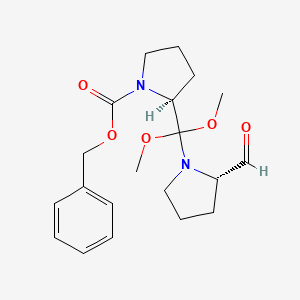 molecular formula C20H28N2O5 B13036923 benzyl (2S)-2-[[(2S)-2-formylpyrrolidin-1-yl]-dimethoxymethyl]pyrrolidine-1-carboxylate 