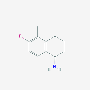 molecular formula C11H14FN B13037483 6-Fluoro-5-methyl-1,2,3,4-tetrahydronaphthalen-1-amine 