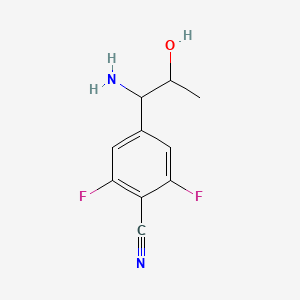 molecular formula C10H10F2N2O B13037845 4-(1-Amino-2-hydroxypropyl)-2,6-difluorobenzenecarbonitrile 