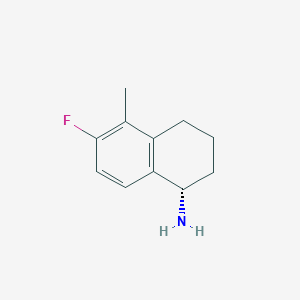 (S)-6-Fluoro-5-methyl-1,2,3,4-tetrahydronaphthalen-1-amine