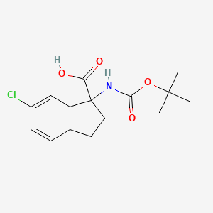 1-((Tert-butoxycarbonyl)amino)-6-chloro-2,3-dihydro-1H-indene-1-carboxylic acid