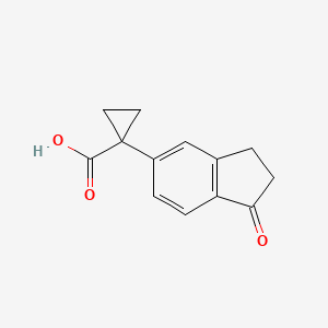 1-(1-Oxo-2,3-dihydro-1H-inden-5-YL)cyclopropane-1-carboxylic acid