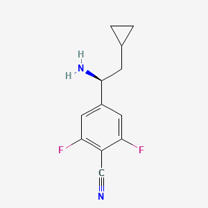 molecular formula C12H12F2N2 B13051155 4-((1S)-1-Amino-2-cyclopropylethyl)-2,6-difluorobenzenecarbonitrile 