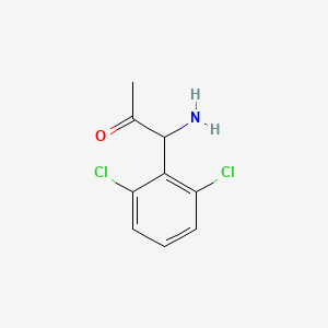 molecular formula C9H9Cl2NO B13054453 1-Amino-1-(2,6-dichlorophenyl)acetone 