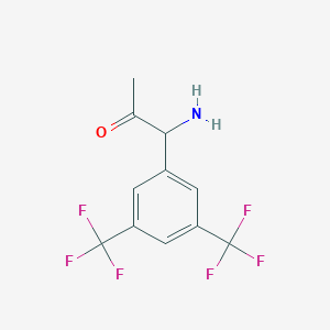 molecular formula C11H9F6NO B13054898 1-Amino-1-[3,5-bis(trifluoromethyl)phenyl]acetone 