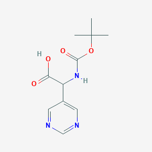 molecular formula C11H15N3O4 B13057501 2-{[(Tert-butoxy)carbonyl]amino}-2-(pyrimidin-5-yl)acetic acid 