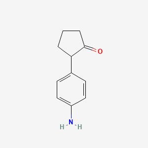 molecular formula C11H13NO B13060044 2-(4-Aminophenyl)cyclopentan-1-one 