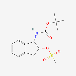 molecular formula C15H21NO5S B13065585 (1S,2R)-1-(Tert-butoxycarbonylamino)-2,3-dihydro-1H-inden-2-YL methanesulfonate 