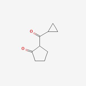 molecular formula C9H12O2 B13065937 2-Cyclopropanecarbonylcyclopentan-1-one 