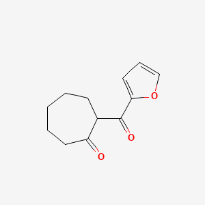 molecular formula C12H14O3 B13066495 2-(Furan-2-carbonyl)cycloheptan-1-one 