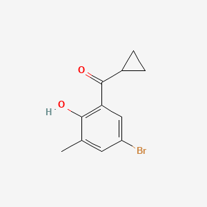 molecular formula C11H11BrO2 B13067413 4-Bromo-2-cyclopropanecarbonyl-6-methylphenol 