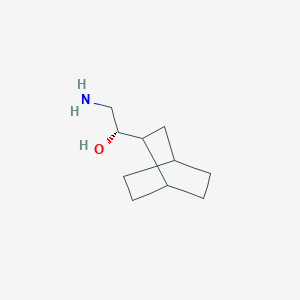 molecular formula C10H19NO B13068560 (1S)-2-Amino-1-{bicyclo[2.2.2]octan-2-yl}ethan-1-ol 