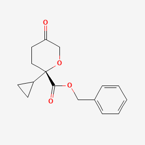 Benzyl(2S)-2-cyclopropyl-5-oxooxane-2-carboxylate