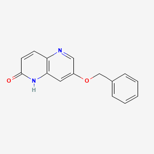 molecular formula C15H12N2O2 B13072692 7-(benzyloxy)-1,5-naphthyridin-2(1H)-one 