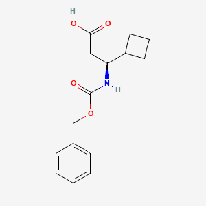 molecular formula C15H19NO4 B13074230 (3S)-3-{[(benzyloxy)carbonyl]amino}-3-cyclobutylpropanoic acid 