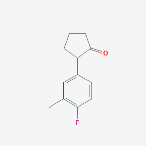 molecular formula C12H13FO B13074994 2-(4-Fluoro-3-methylphenyl)cyclopentan-1-one 