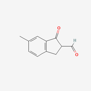 molecular formula C11H10O2 B13075427 6-methyl-1-oxo-2,3-dihydro-1H-indene-2-carbaldehyde 