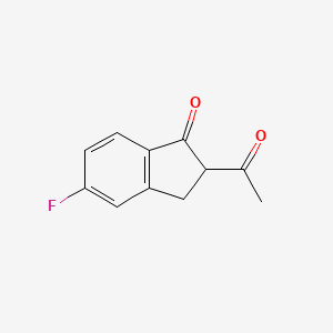 molecular formula C11H9FO2 B13076000 2-Acetyl-5-fluoroindan-1-one 