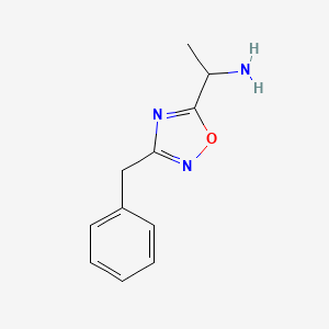 molecular formula C11H13N3O B13076888 1-(3-Benzyl-1,2,4-oxadiazol-5-yl)ethan-1-amine 