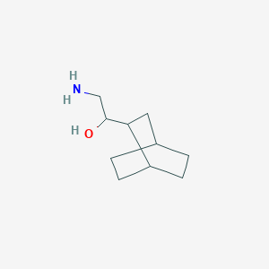 molecular formula C10H19NO B13078236 2-Amino-1-{bicyclo[2.2.2]octan-2-yl}ethan-1-ol 