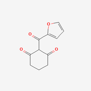 2-(Furan-2-carbonyl)cyclohexane-1,3-dione