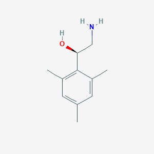 molecular formula C11H17NO B13087427 (1R)-2-amino-1-(2,4,6-trimethylphenyl)ethan-1-ol 