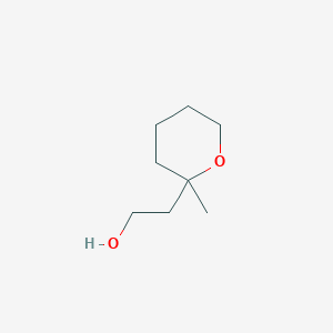 2-(2-Methyloxan-2-yl)ethan-1-ol