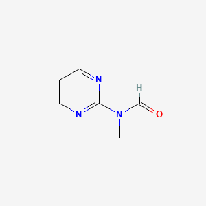 molecular formula C6H7N3O B13104684 N-Methyl-N-(pyrimidin-2-yl)formamide 