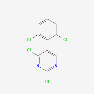 molecular formula C10H4Cl4N2 B13107529 2,4-Dichloro-5-(2,6-dichlorophenyl)pyrimidine 