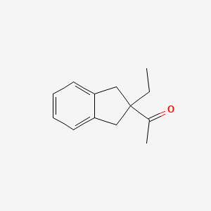 B1311659 1-(2-Ethyl-2,3-dihydro-1H-inden-2-yl)ethanone CAS No. 161695-23-4