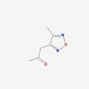 molecular formula C6H8N2O2 B13116865 1-(4-Methyl-1,2,5-oxadiazol-3-yl)propan-2-one 