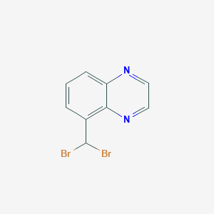 molecular formula C9H6Br2N2 B1312403 5-(二溴甲基)喹喔啉 CAS No. 958994-25-7