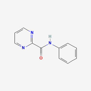 molecular formula C11H9N3O B13130438 N-Phenyl-2-pyrimidinecarboxamide 