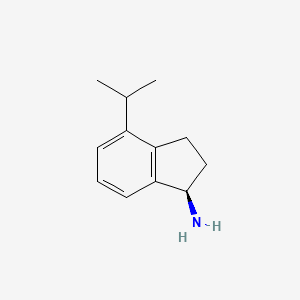 molecular formula C12H17N B13132123 1H-Inden-1-amine,2,3-dihydro-4-(1-methylethyl)-,(1R)- 