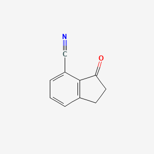 molecular formula C10H7NO B1313244 2,3-二氢-3-氧代-1H-茚-4-腈 CAS No. 215362-26-8