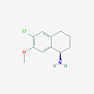 (1R)-6-chloro-7-methoxy-1,2,3,4-tetrahydronaphthalen-1-amine