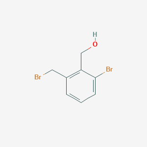 molecular formula C8H8Br2O B13143768 (2-Bromo-6-(bromomethyl)phenyl)methanol 