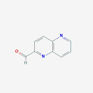molecular formula C9H6N2O B1314434 1,5-萘啶-2-甲醛 CAS No. 883864-92-4
