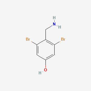 molecular formula C7H7Br2NO B13148131 4-(Aminomethyl)-3,5-dibromophenol 