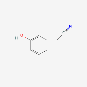 molecular formula C9H7NO B13149429 4-Hydroxybicyclo[4.2.0]octa-1,3,5-triene-7-carbonitrile 