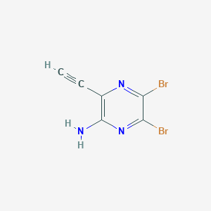 molecular formula C6H3Br2N3 B13150373 5,6-Dibromo-3-ethynylpyrazin-2-amine 