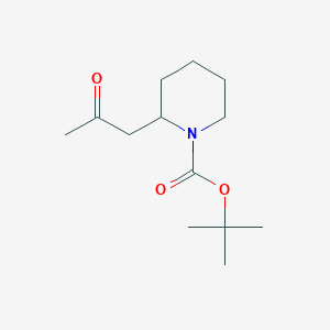 molecular formula C13H23NO3 B13151080 tert-Butyl 2-(2-oxopropyl)piperidine-1-carboxylate 