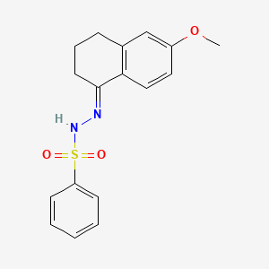 molecular formula C17H18N2O3S B1315176 (E)-N'-(6-甲氧基-3,4-二氢萘-1(2H)-亚甲基)苯磺酰肼 CAS No. 66227-85-8